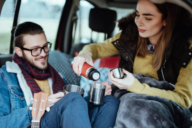 istock Couple taking little break for hot tea 901907408
