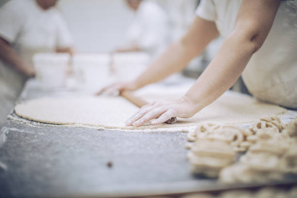 istock Woman preparing pretzels 901923490