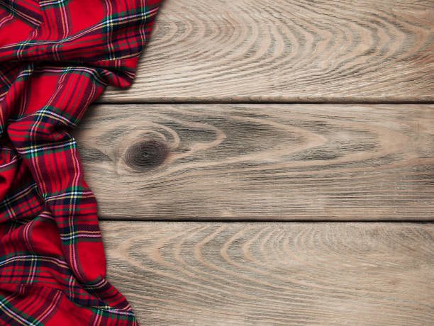 Checkered napkin on a wooden background