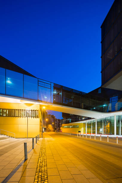 istock Modern Glass Bridge In Aachen, Germany At Night 901933034