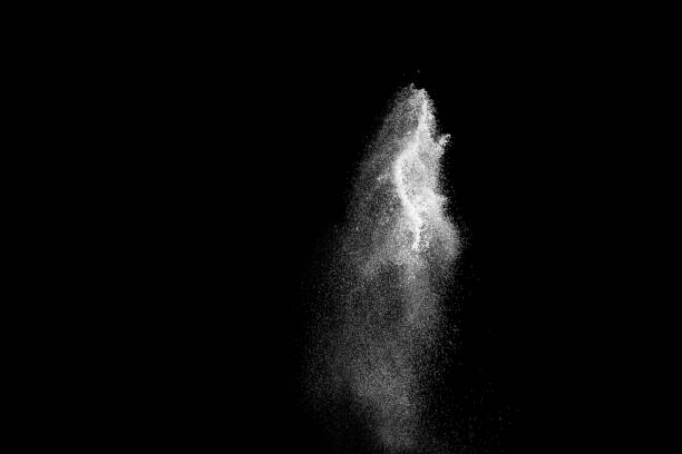 istock Launched white powder splash on black background. Bizarre forms of of white powder explosion cloud against dark background. 901934390