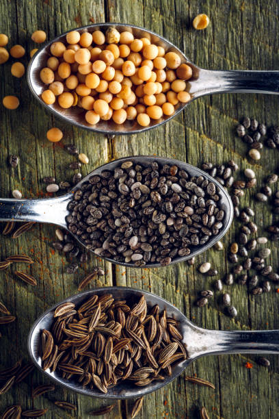 istock Spoons of cumin and mustard, chia seeds 901937082