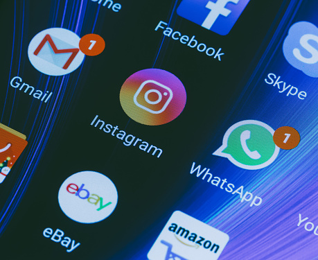 Adygea, Russia - January 2, 2018: WhatsApp, YouTube, instagram, Facebook, Skype and other app icons on the smartphone screen Xiaomi