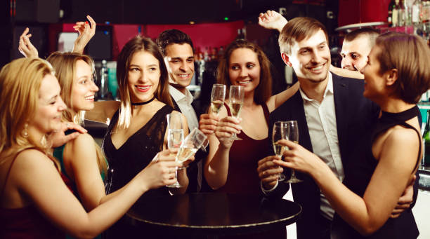 istock Cheerful working team are resting and drinking cocktails 901949088