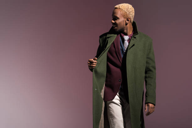 istock man wearing green winter coat 901953620