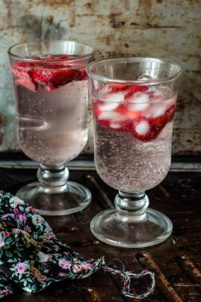 istock cocktail with ice and fresh strawberry slices 901964620