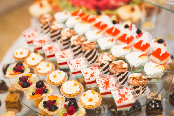 istock Different kinds of baked sweets on a buffet 901968398