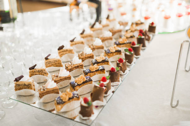istock Delicious sweets on wedding candy buffet with desserts, cupcakes 901968546