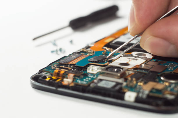 istock A process of mobile phone repairing and other gadgets 901969968