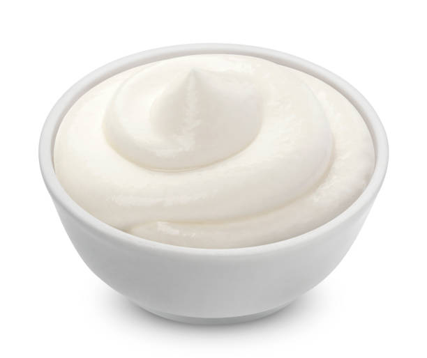 istock Sour cream in bowl isolated on white background 901970330