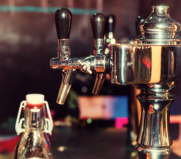 istock Beer taps in row at restaurant or pub 901973470