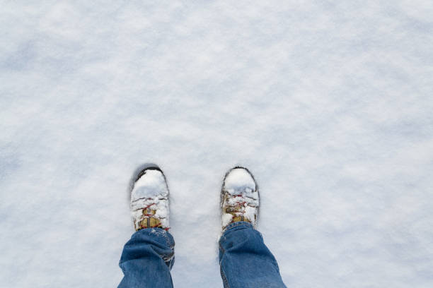 Winter Shoes Footprint In Fresh Snow Blue Jeans Trousers Copyspace Stock  Photo - Download Image Now - iStock