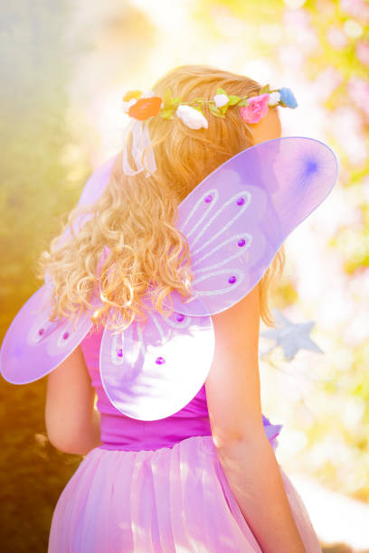 istock Little fairy with magic wand 901983614
