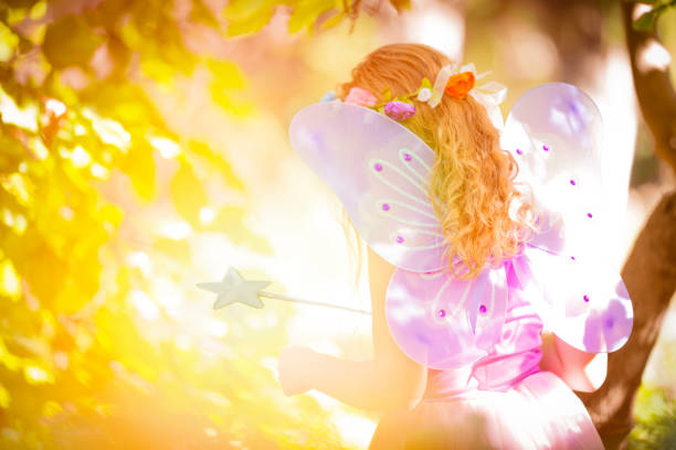 istock Little fairy with magic wand 901985002