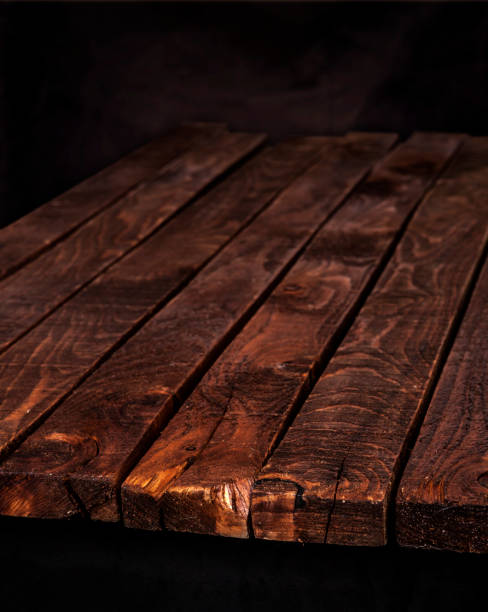 istock Dark wood table, brown wooden background 901985038