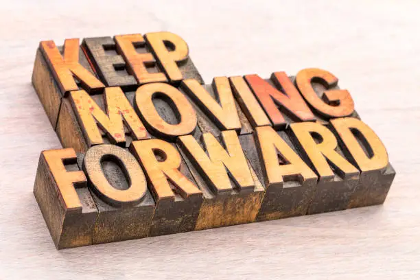 keep moving forward word abstract typography in vintage lettepress wood type