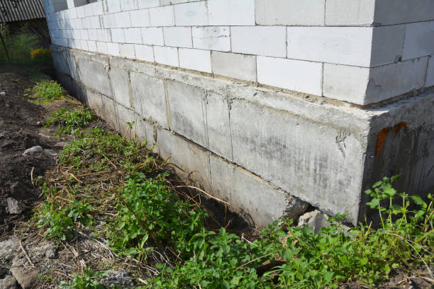 istock Close up on Waterproofing and insulation house foundation wall. Foundation Waterproofing and Damp proofing Coatings. 901991250