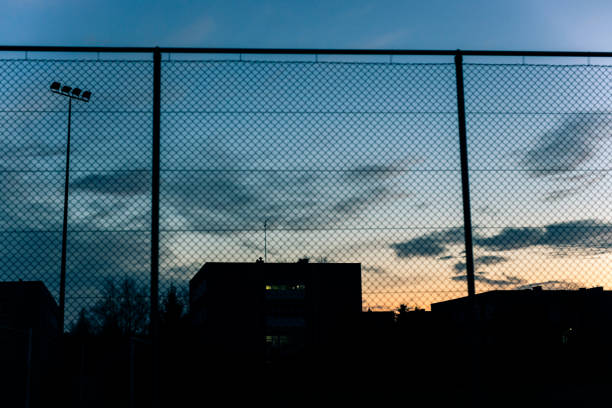istock Metal fence against the sky 901991324