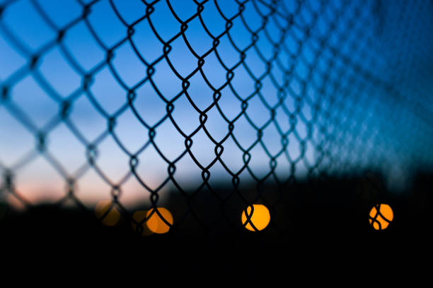 istock Metal fence against the sky 901991394