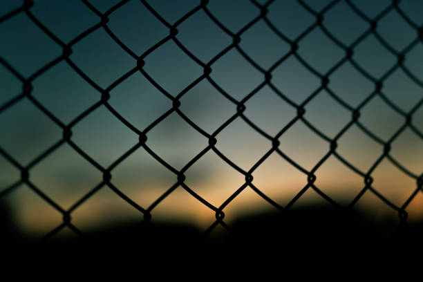 istock Metal fence against the sky 901991454