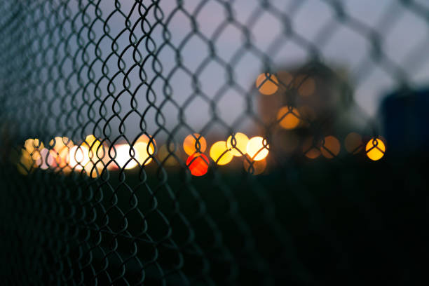istock Metal fence against the sky 901991536