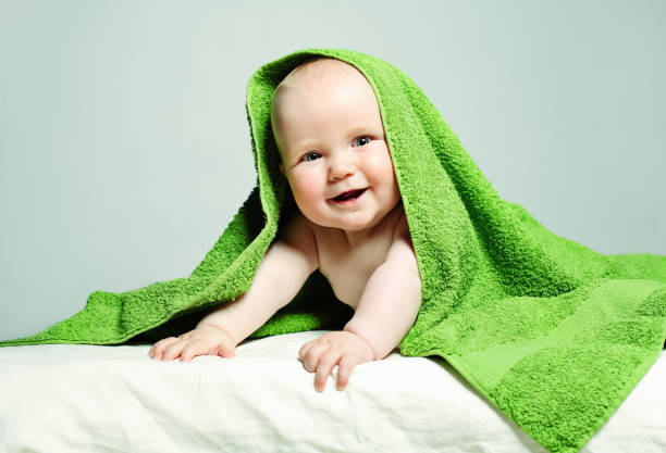 istock Smiling Baby, Parental Care Concept 901995664