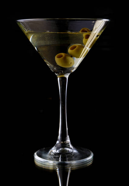 istock Martini with olives on a black background 902003826