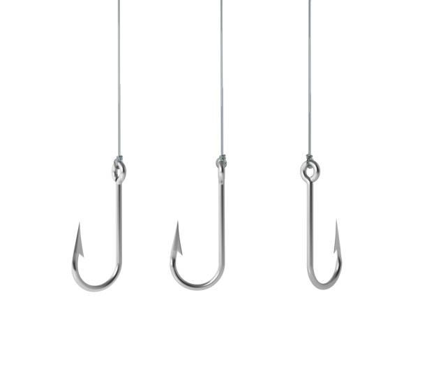 Fishing Hooks On White Background Fishing hooks on white background. Horizontal composition. Clipping path is included. hook equipment photos stock pictures, royalty-free photos & images
