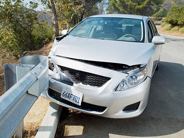 Car wrecked on road guardrail  rail car stock pictures, royalty-free photos & images