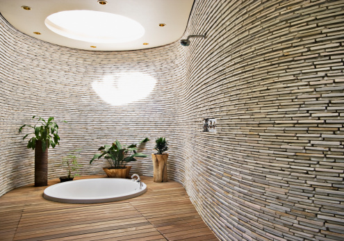 Bañera romana en el baño moderno photo