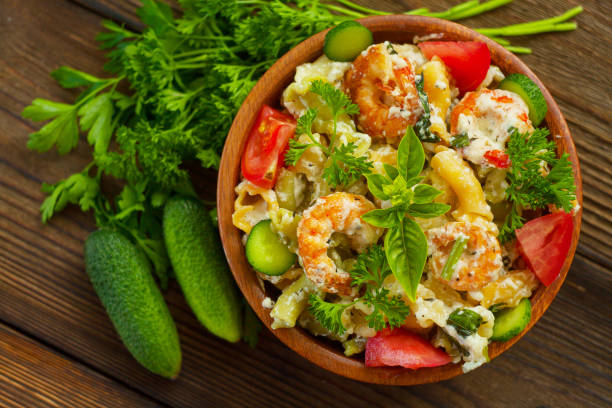 istock delicious gigli t with shrimps and basil on  plate 902015640