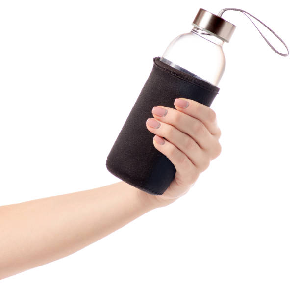 istock Bottle of water in a hand 902018714