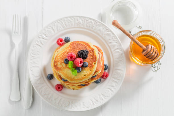 istock Top view of american pancakes with berries 902027612