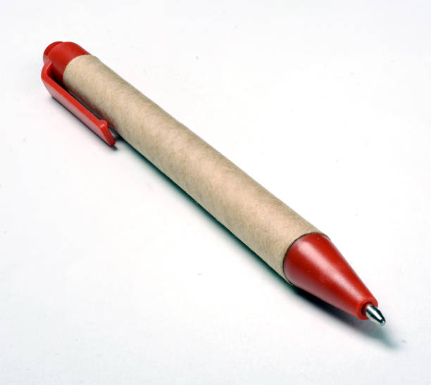 istock paper ballpoint pen on a white background 902035008