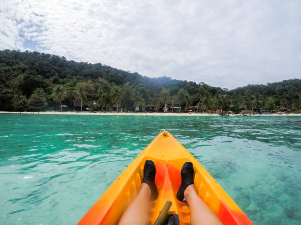 POV Sports - Personal perspective of woman kayaking on beautiful South China Sea at Perhentian Island, Malaysia POV of woman kayaking on the sea, Perhentian Island terengganu stock pictures, royalty-free photos & images