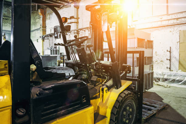 Close up of Forklift Truck inside warehouse or factory or logistics company stock photo