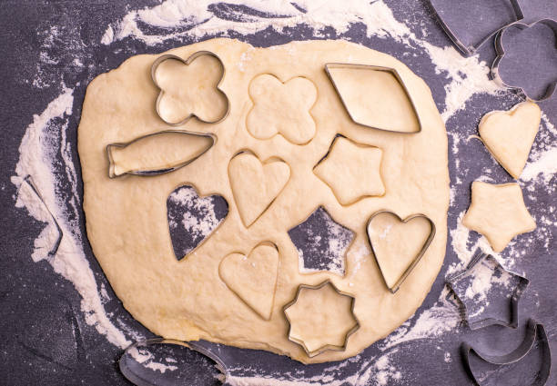 istock cut out from the dough shape for baking cookies 902053576