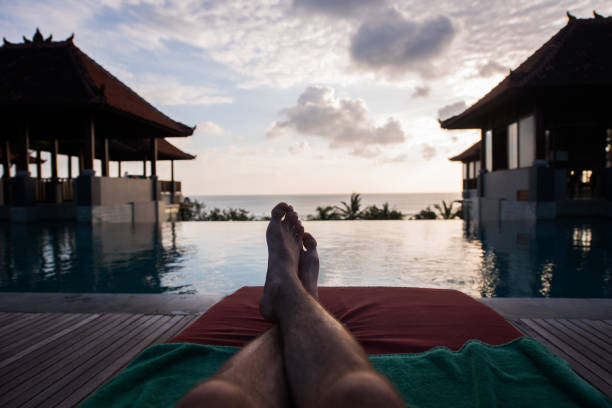 istock Close up of man's legs on the pool. 902060518