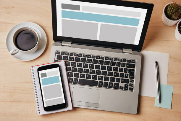istock Responsive design concept on laptop and smartphone screen 902074394