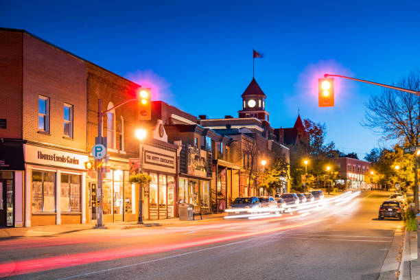 Downtown Huntsville Ontario Canada Long exposure stock photograph of Main street with illuminated businesses in Downtown Huntsville, Muskoka region, Ontario, Canada, at twilight blue hour. huntsville ontario stock pictures, royalty-free photos & images