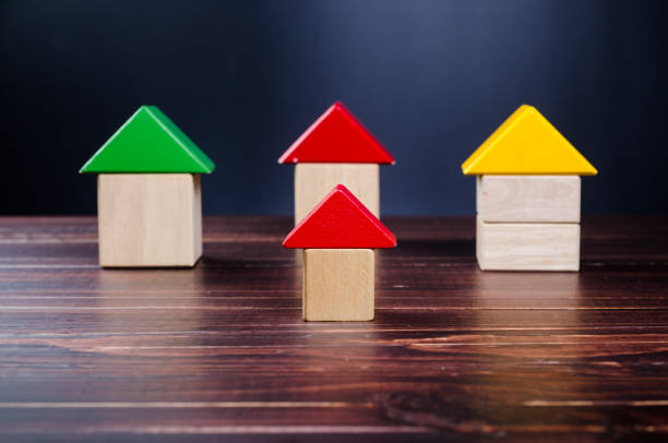 istock House from wooden toy blocks 902106486