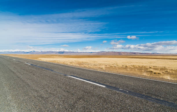 istock Federal highway M-52 Chuysky tract against the blue clear sky. 902116734