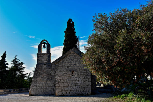 istock Little stone Church on Marjan Hill, Split, Croatia 902124528