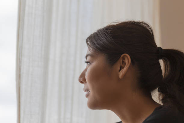 istock A woman relaxing in the room 902128578