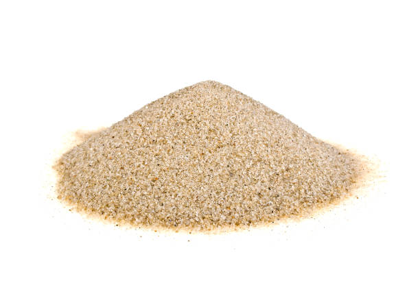 istock Pile of sand isolated on a white background 902131742