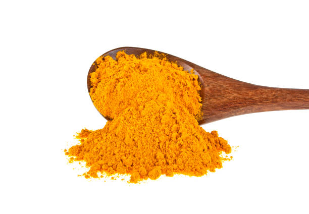 istock Turmeric powder isolated on white background. Curcuma powder. 902132416