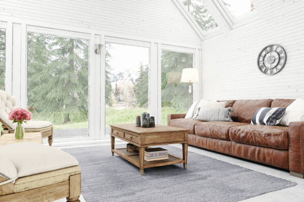 Rustic Living Room Interior Living room of a chalet with forest and mountain view. modern cottage interior design stock pictures, royalty-free photos & images