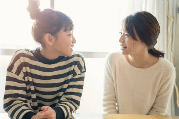 istock Mother and daughter relax at home 902137374