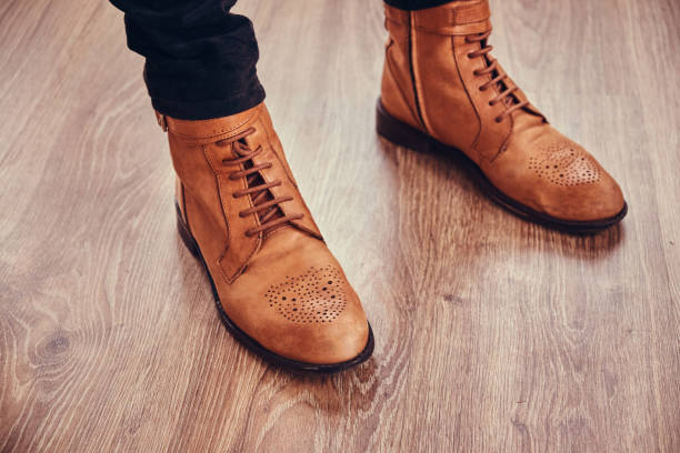 istock Brown leather woman boots. 902141794