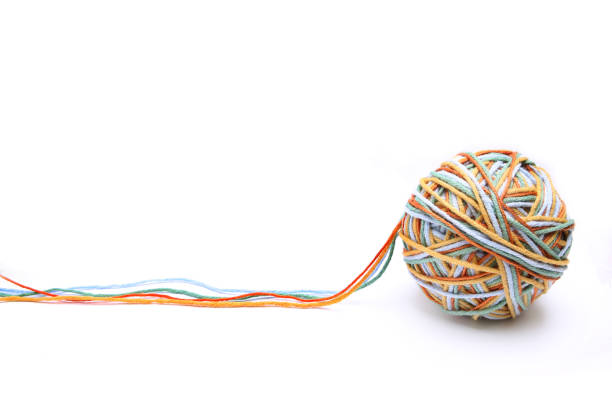 Different color (orange, yellow, green, blue) thread mix.